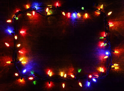 Colorful Christmas Lights on Wood - Creative Stock Images and Animations for all your Needs at Budget Price.